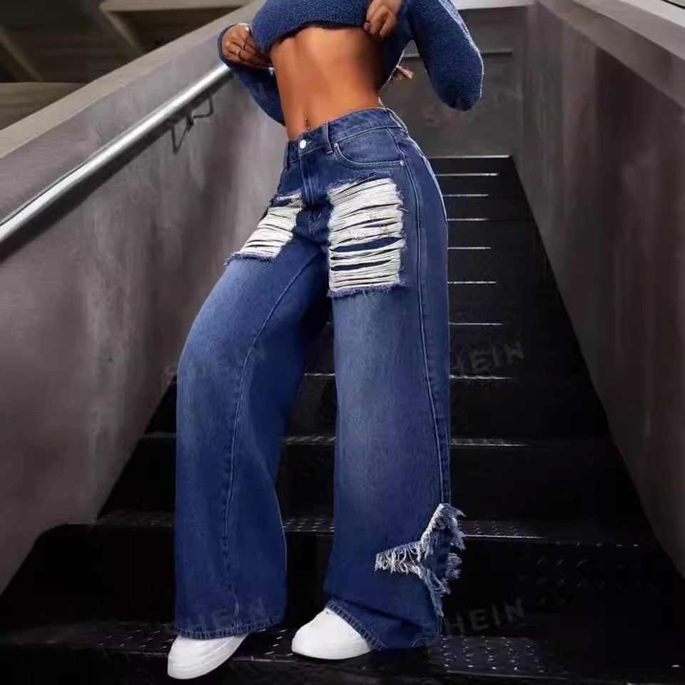 Street star energy.

Wide-leg ripped denim with bold patchwork, star detail, and full statement power. This jean was built for stairs, camer