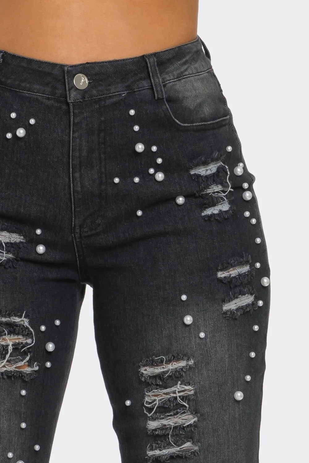 Black statement jean with beaded detail and dramatic wool/fur hem. This is a runway-style piece for the premium Bell look.